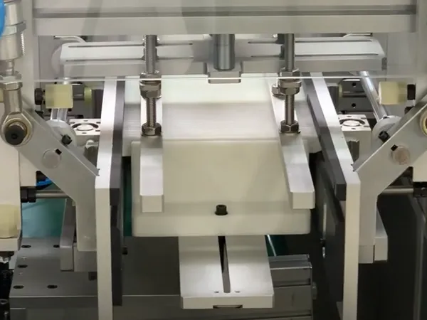 Automatic machine producing cabin air filters.