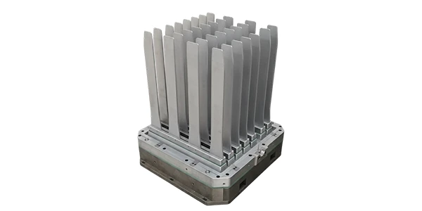 This is a precision metal tooling fixture with upright slats, used for workpiece positioning in industrial manufacturing.