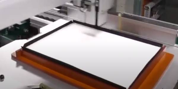 A paper frame gluing line of hepa filter.