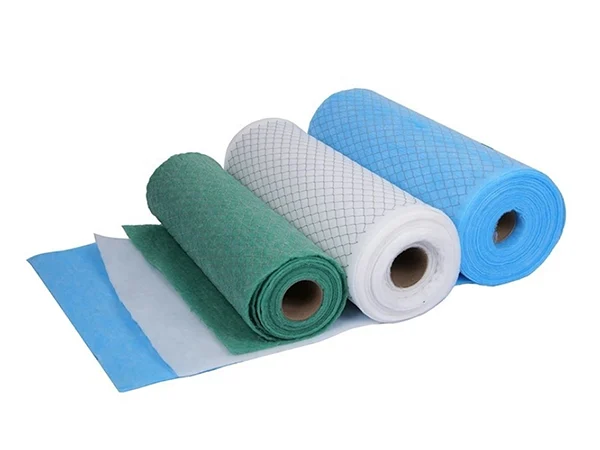 Three colorful rolls of primary-efficiency filter media with a metal mesh support layer