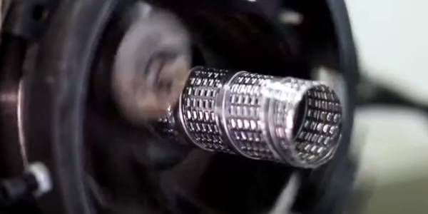 A machine is producing center tube.