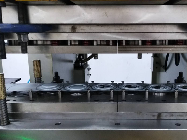A set of sealing plate progressive die